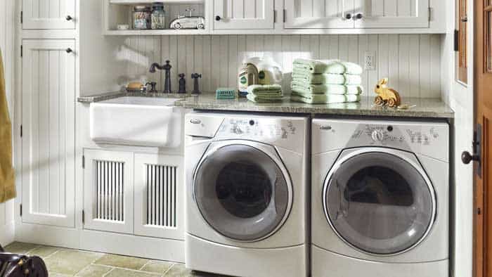 A Utility Sink Next To Washer